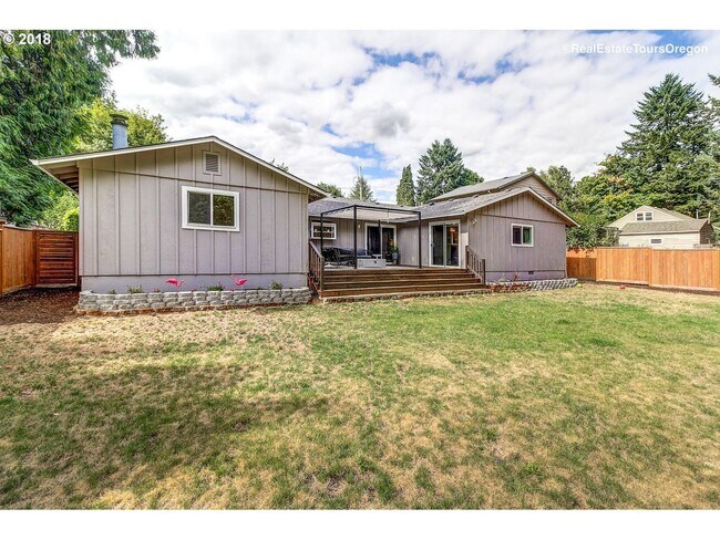 Building Photo - Spacious 4-Bedroom Home with Multiple Livi...