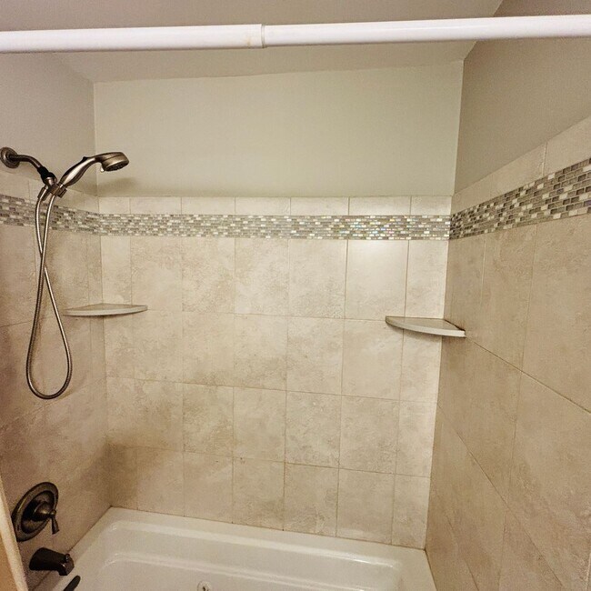 Building Photo - Spacious 3-Bedroom, 3-Bathroom Townhome with Finished Basement, Garage & Fenced Yard