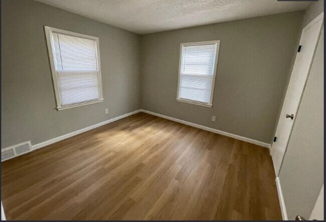 Building Photo - Welcome to Your Next Home with Harvest Investments!