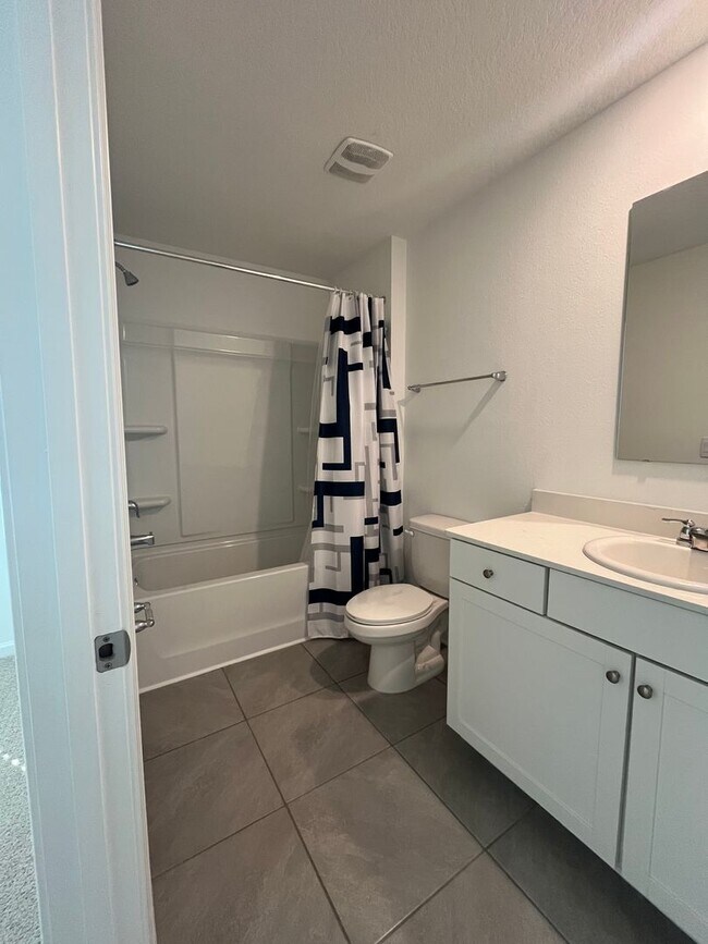 Building Photo - Town Home in The Trails -2 Primary Suites!!