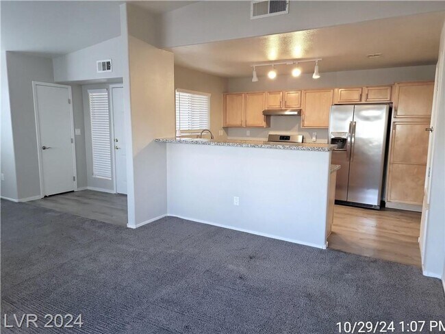 Building Photo - SECOND-FLOOR UNIT IN A GATED SOUTHWEST COM...