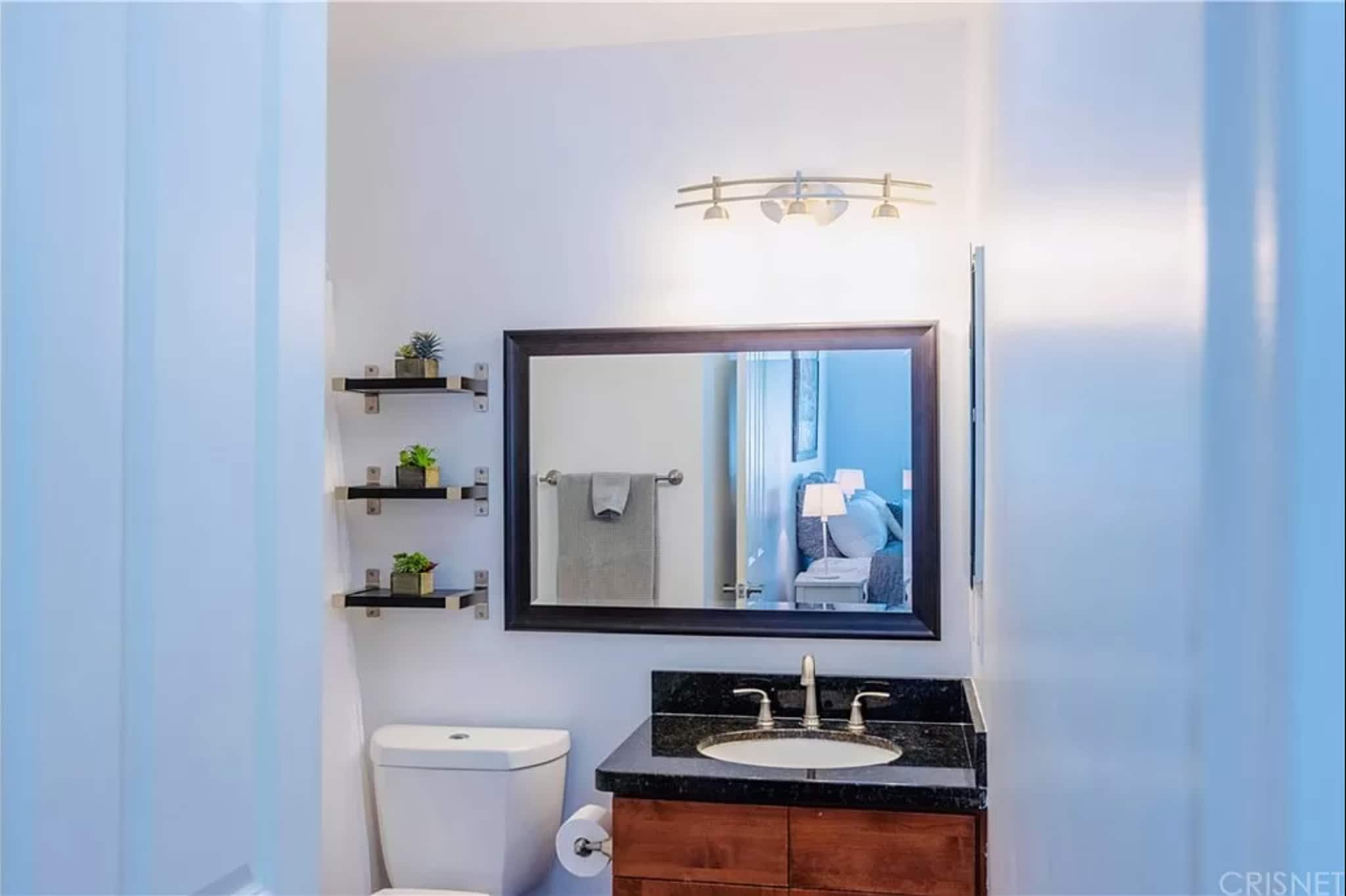 Ensuite master bathroom. Tub and shower. - 1554 N Hobart Blvd