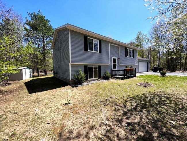 Building Photo - Bright, Spacious, and Surrounded by Nature