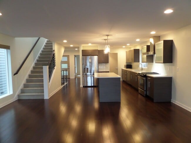 Building Photo - Immaculate and LARGE 4-Bedroom Home in Unb...