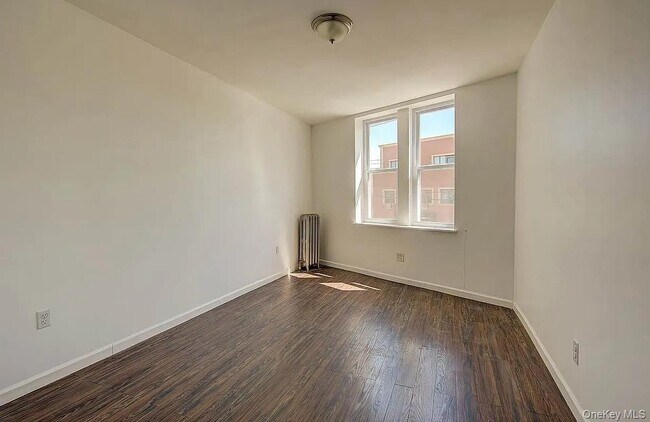 Building Photo - 72-52 Metropolitan Ave