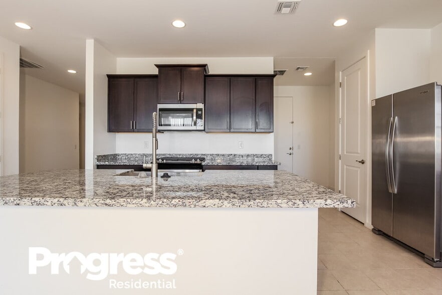 Building Photo - 11010 W Luxton Ln