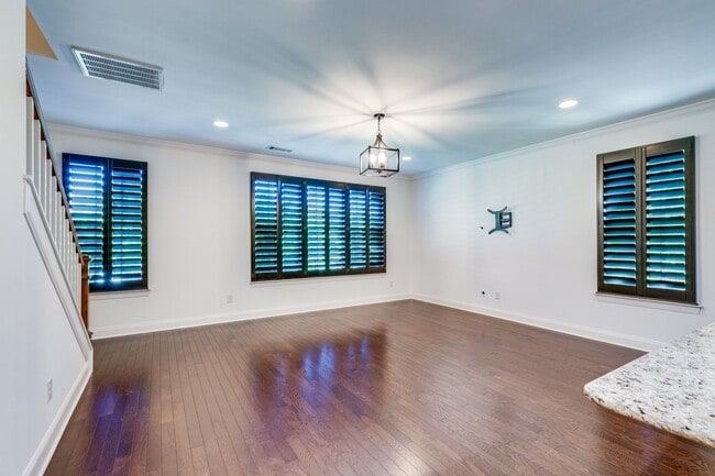 Building Photo - Welcome to this charming end unit townhome