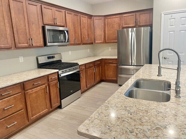 Building Photo - Three Bedroom Home In Gated 55+ Exclusive ...