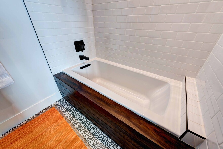 deep bathtub with walnut wrap. - 2820 Panorama Dr