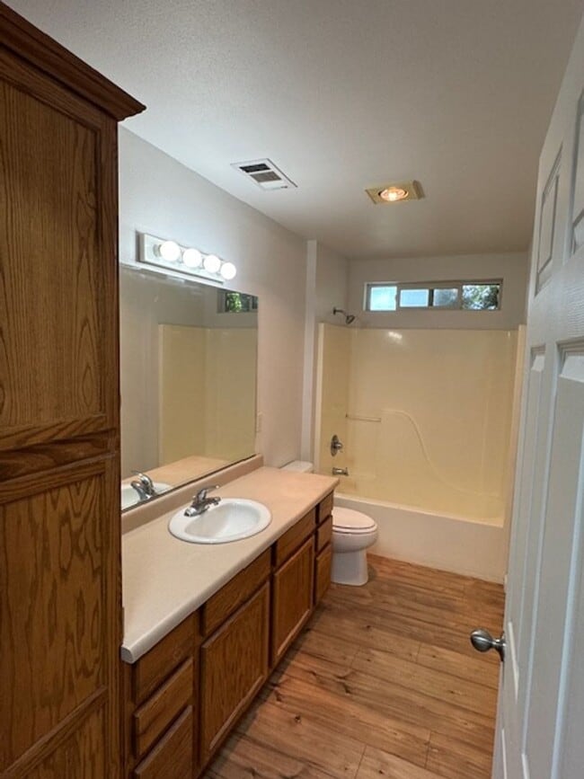Building Photo - COMING SOON - 3 BEDROOM TOWNHOME W/ GARAGE- FRESH PAINT AND NEW FLOORING