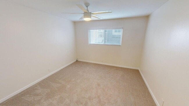 Building Photo - Spacious 2 Bedroom Condo in Central Village with AC. Water, Cable, Trash Included!