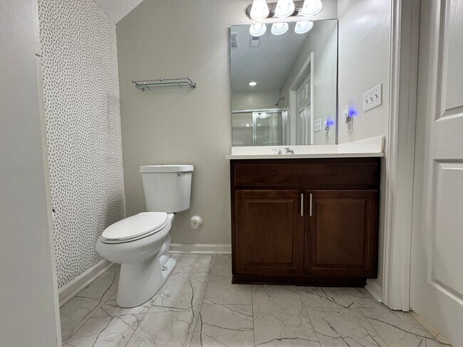 Building Photo - Beautiful, Conveninetly located First Floor Condo
