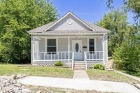 Building Photo - Remodeled 2-Bedroom Bungalow with Spacious Yard & 1-Car Basement Garage