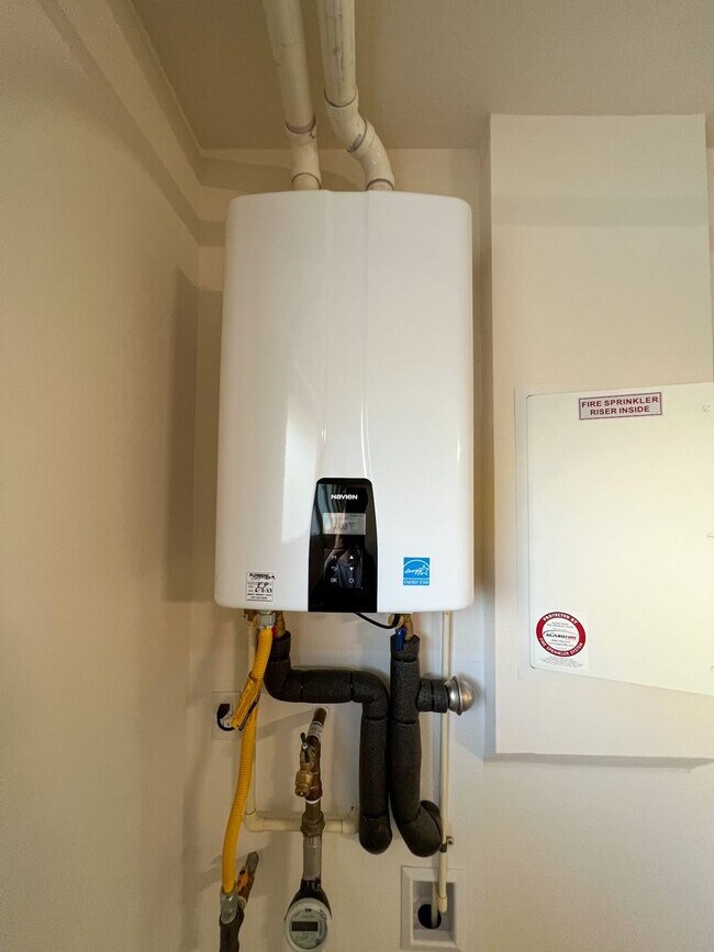 Building Photo - Newly Built Condo with SOLAR for LEASE in ...