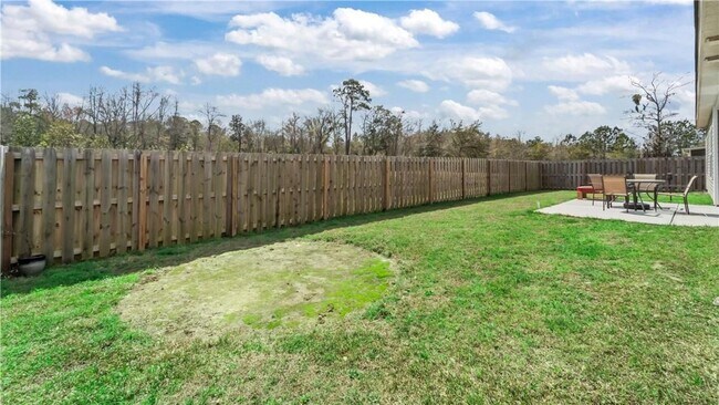 Building Photo - Relax & Unwind at this 4-Bedroom Home with Scenic Lagoon Views in Rincon