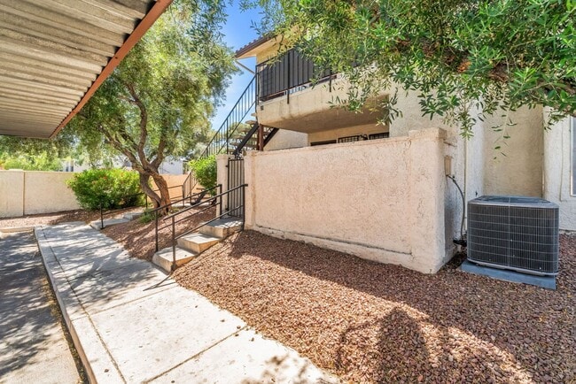 Building Photo - Modern Gated Condo Near the Strip with Pool & Covered Parking!