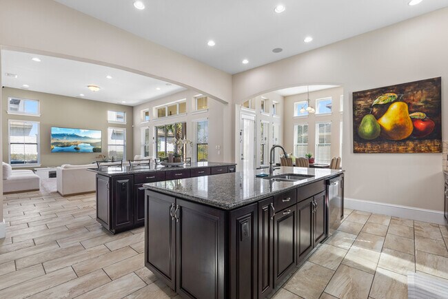 Building Photo - Luxury Waterfront Pool Home in Laureate Park | 4BR + Water Views