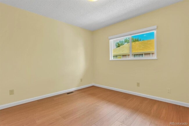 Building Photo - 8913 E Chenango Ave