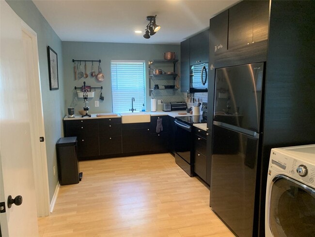 Building Photo - 6241 Wheaton Dr