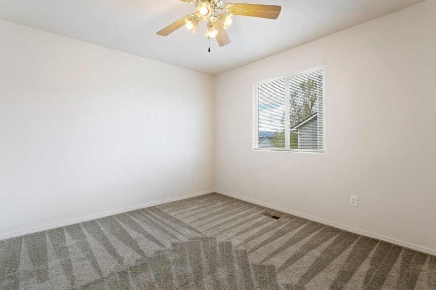 Building Photo - Spacious 4-Bedroom Home with Finished Base...