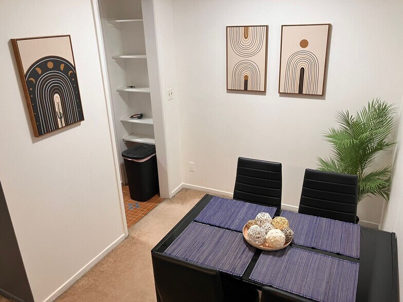 Modern dining area with table for 4 - 8200 E Jefferson Ave