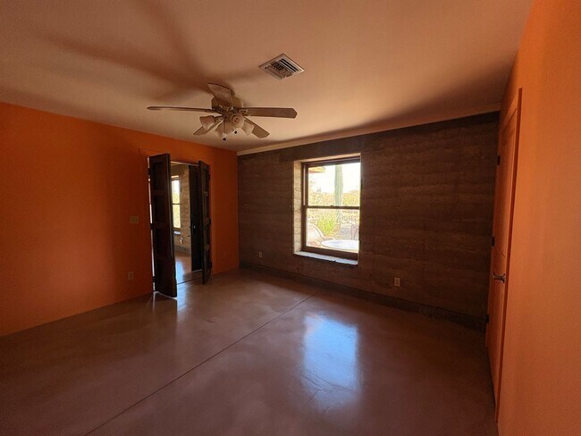 Building Photo - Desert Home on 3.3 Acres with Rooftop Views & Unique Rammed Earth Design