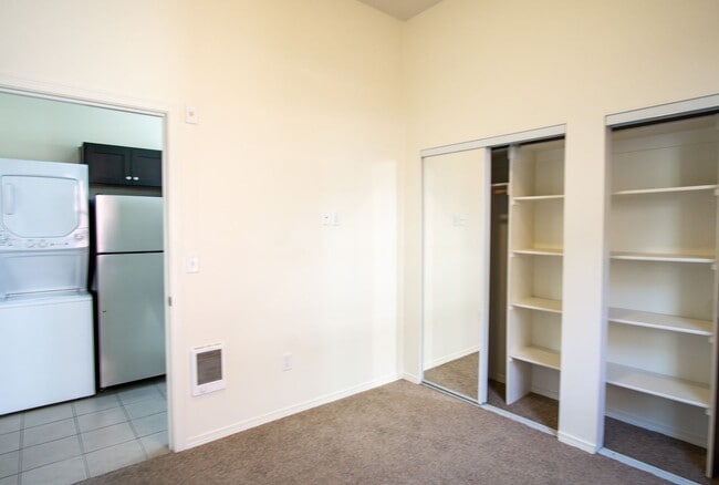 Building Photo - Corner 2 Bedroom with DW, W/D, Fireplace +...