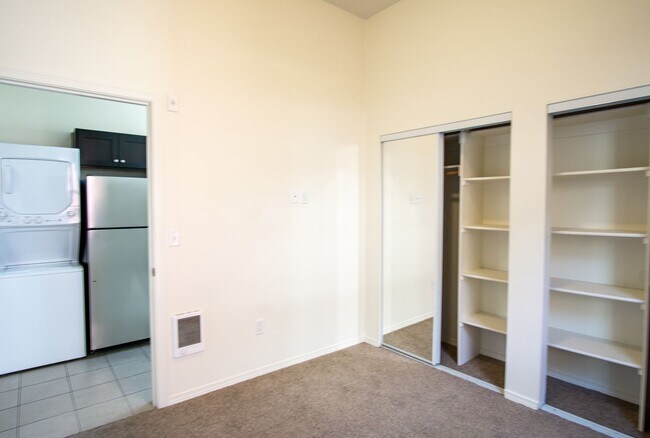 Building Photo - Corner 2 Bedroom with DW, W/D, Fireplace + Juliette Balcony!