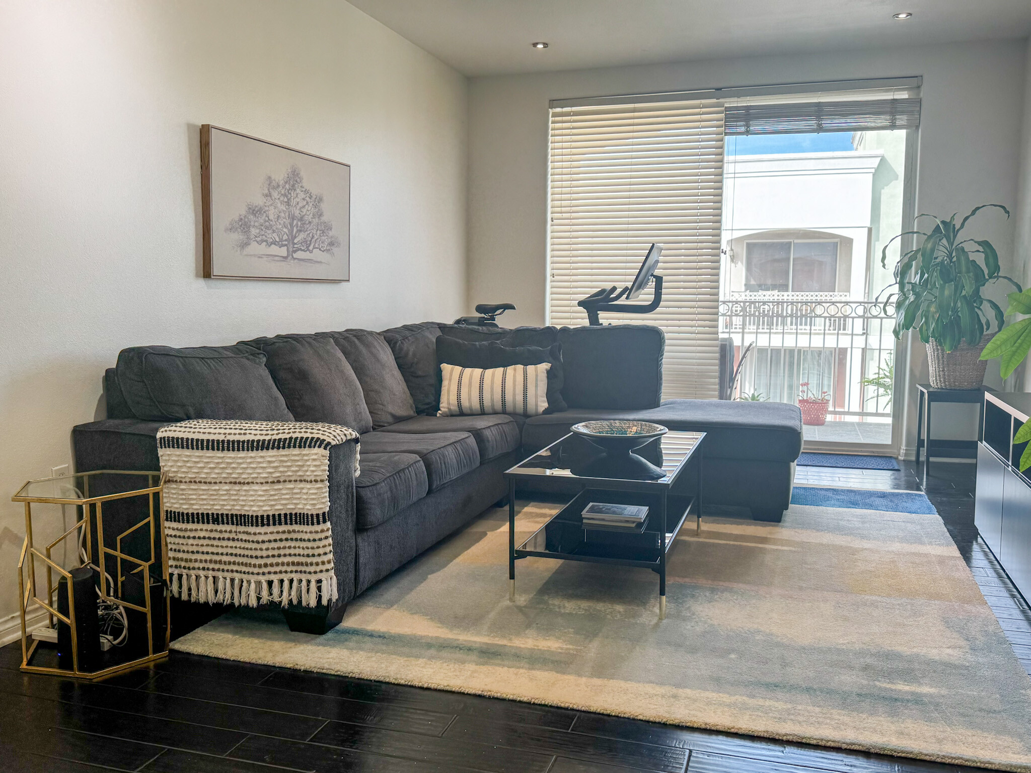 Spacious living room with large sliding doors to balcony - 3740 Santa Rosalia Dr