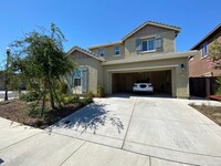 Building Photo - Specious Home has 3 bedrooms, 3.5 baths,  ...