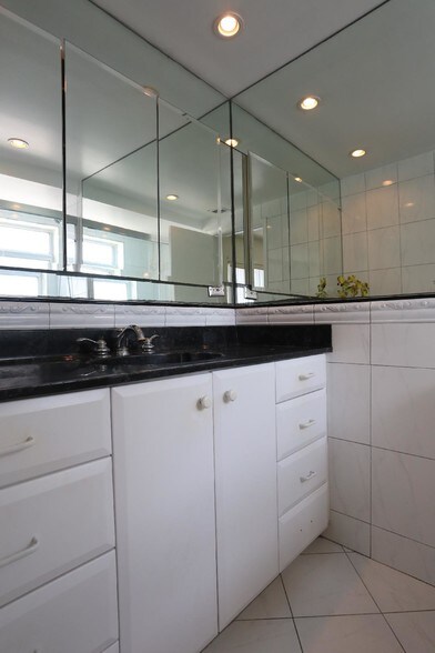 Master bathroom with lots of storage. - 1500 S Ocean Blvd