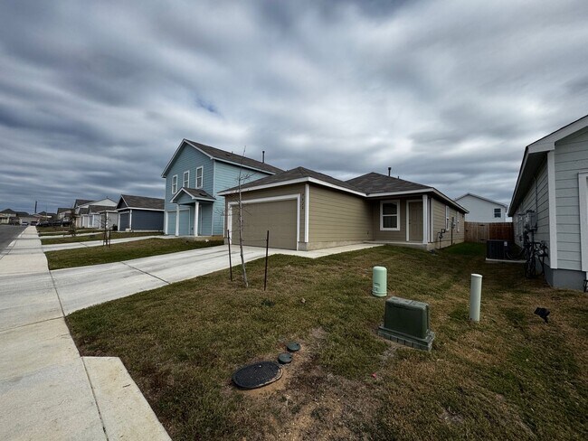 Building Photo - Modern 2024 New-Build with Open-Concept Living and Private Primary Suite in Waterwheel Subdivision