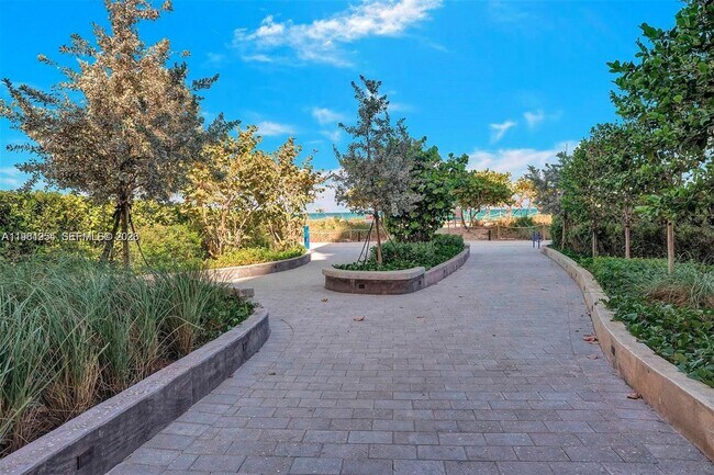 Building Photo - 8911 Collins Ave