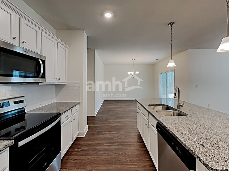 Building Photo - 7053 Creeksong Dr