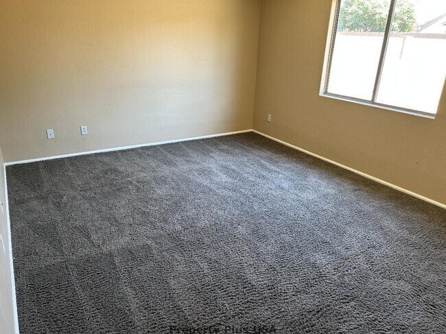 Building Photo - "Charming 3-Bed Oasis with 2 Baths in Maricopa – Cozy 1,276 Sq Ft Haven!"