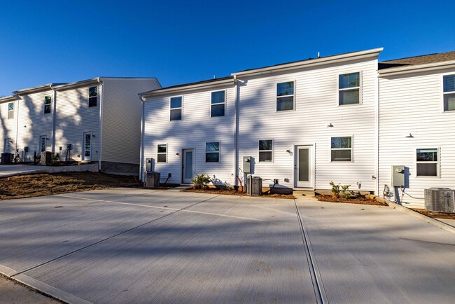 Building Photo - READY IN AUGUST 3 br 2.5 Townhome Near His...