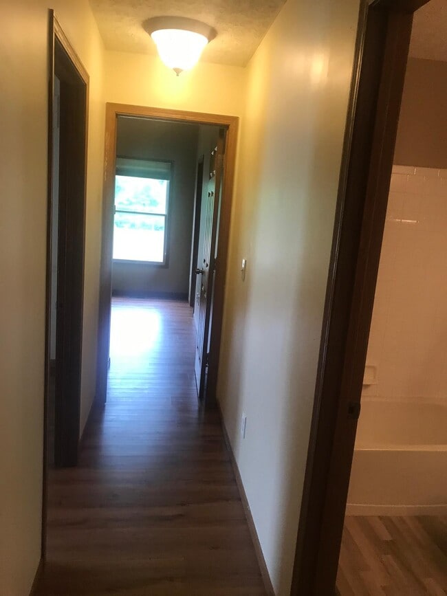 upstairs hallway to bedrooms - 8453 Olenbrook Dr