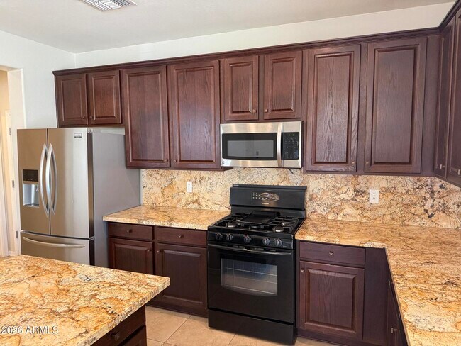 Building Photo - 9237 W Coolbrook Ave