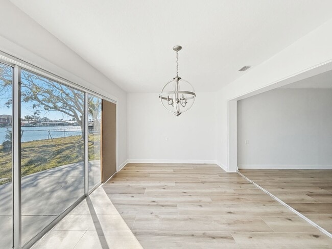 Building Photo - Amazing Indian Rocks Beach Waterfront Rental – Dock, Boat Lift & Garage! 3bed | 2bath