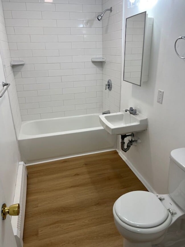 Building Photo - Pet Friendly Renovated Brookline Gem with Laundry in Unit and 1 Parking is a steal!