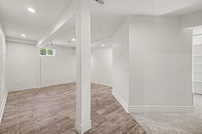Building Photo - Spacious 4-Bedroom, 2-Bath Home with Large Yard, Garage & Central A/C