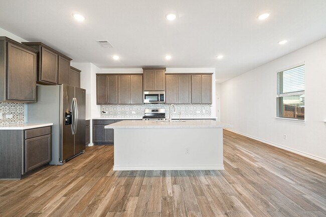 Building Photo - Homey 4 Bedroom, 2 Bath, 1-Story Home in H...