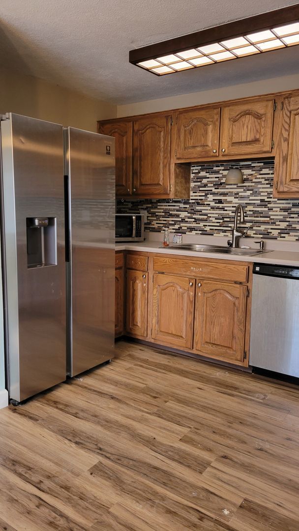 Building Photo - 7611 Blossomview Ct. - 3 bedroom 2 bath ra...
