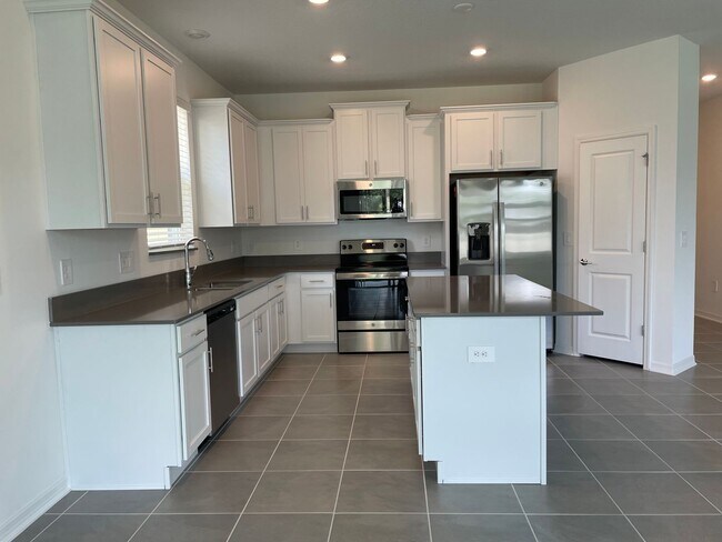 Building Photo - 4 bedroom home $2,195/mo, Storey Creek