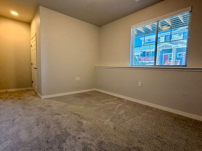 Building Photo - Move-In Ready 3-Story Townhome with Loft & 2-Car Garage