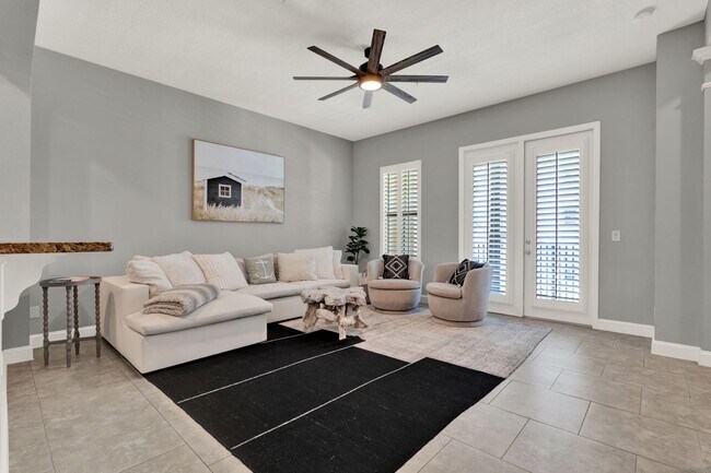 Building Photo - Stunning 3/3.5 Baldwin Park Townhome with 2-Car Garage & Upgrades Galore!