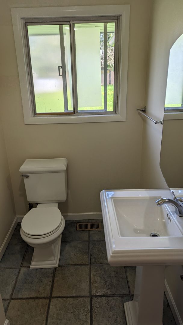 Building Photo - Spacious Three Bedroom with Large Backyard...