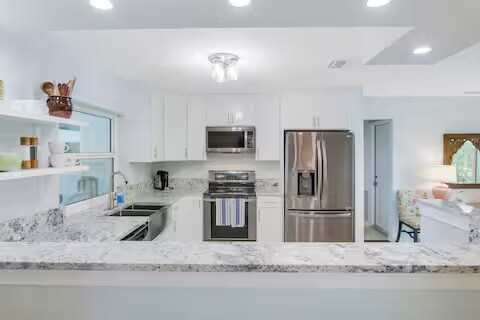 Building Photo - 2473 N W Everglades Blvd