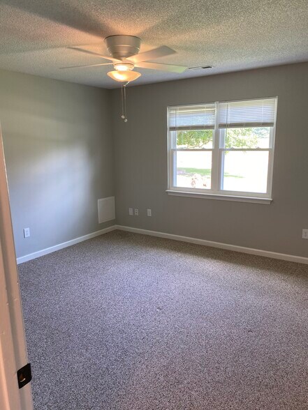Bedroom 1- Now has LVP Floors - 411 W Young St