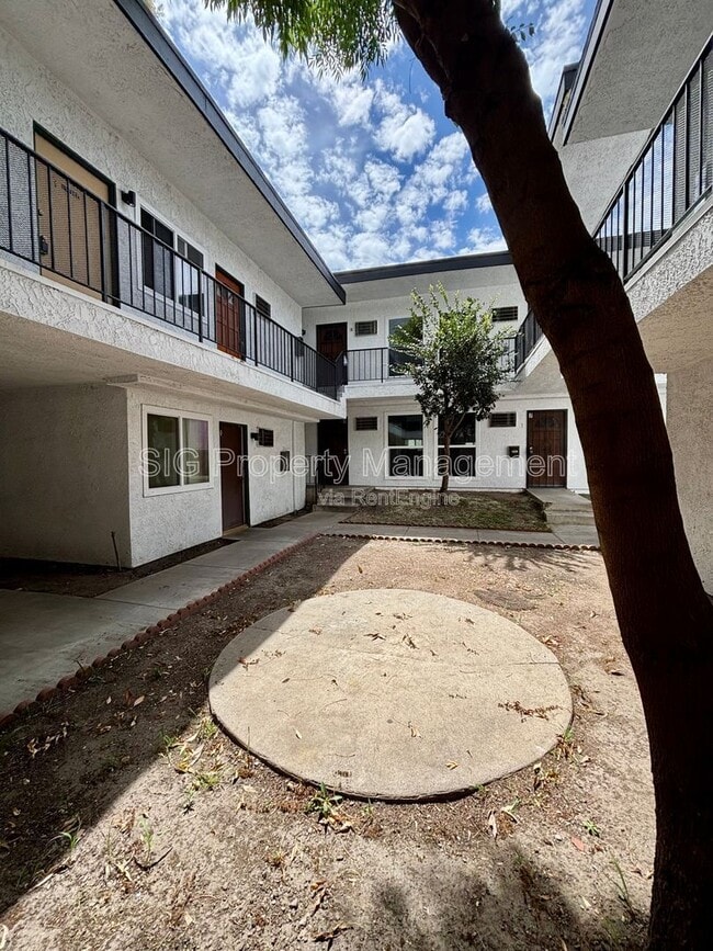 Building Photo - 10635 Sherman Grove Ave